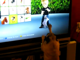 ゲームの犬と遊びたくて仕方がないパグ犬